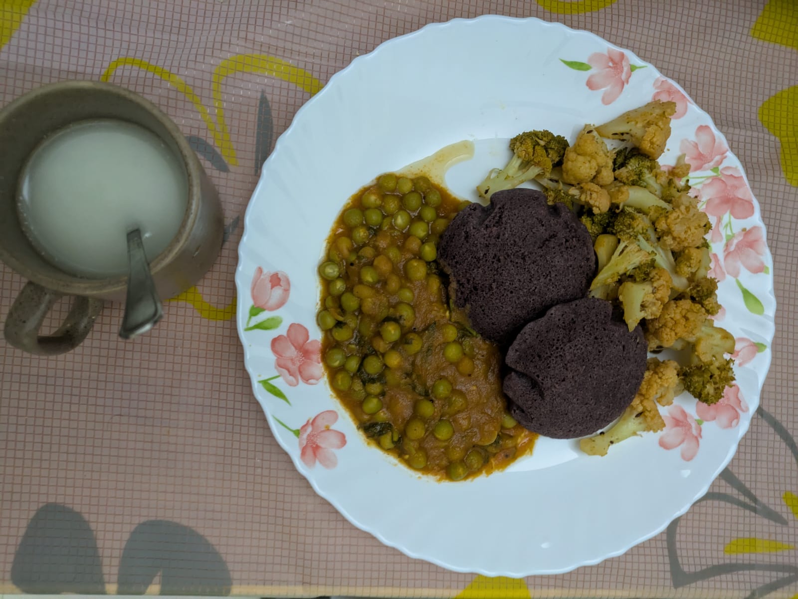 Ragi idlis with peas kurma and spiced cauliflower from the couple's meal plan