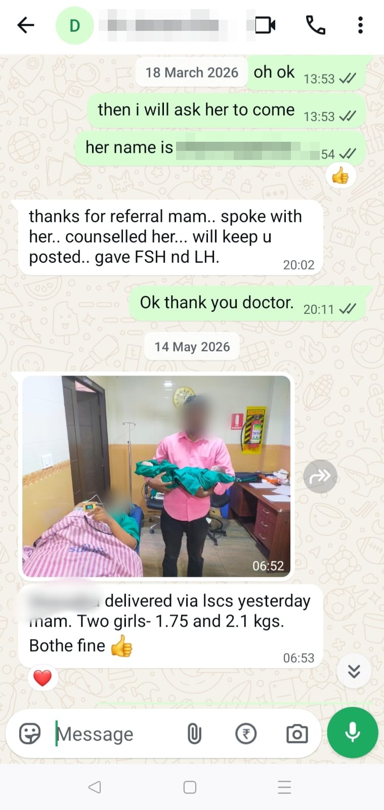A photo shared after delivery, with the babies held safely, faces protected for privacy